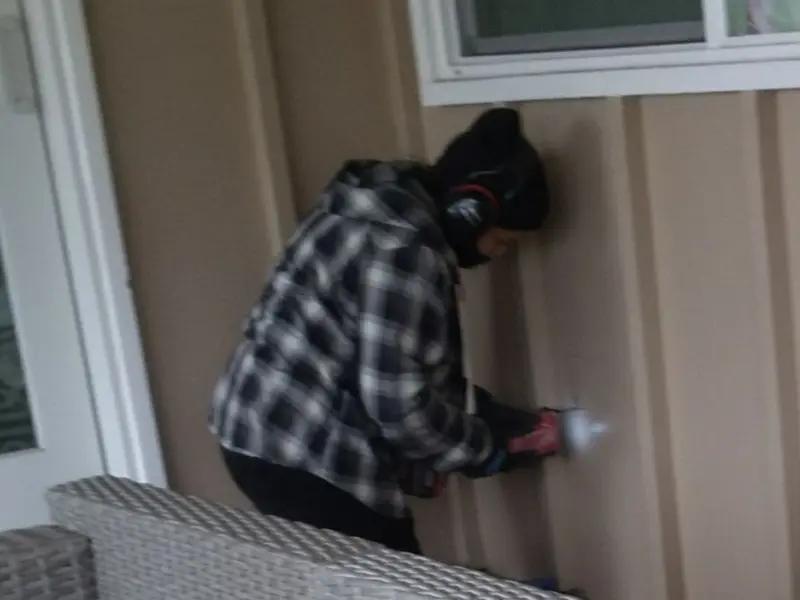 Professional electrician installing an exterior outlet in Colorado City