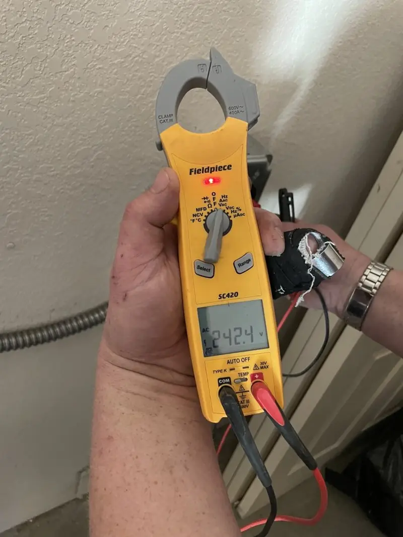 Voltage testing with clamp meter during Outlet Installation in Colorado City